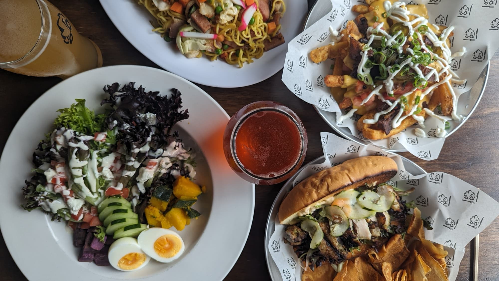 Beer Lab — The HALL at Pearlridge — beer food spread overhead