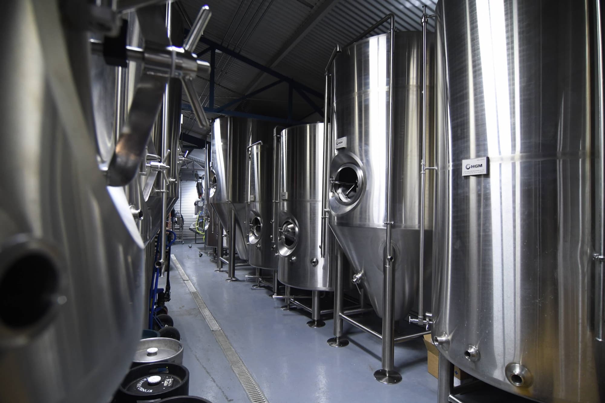 Honolulu Beerworks — fermenter tanks brewhouse aisle