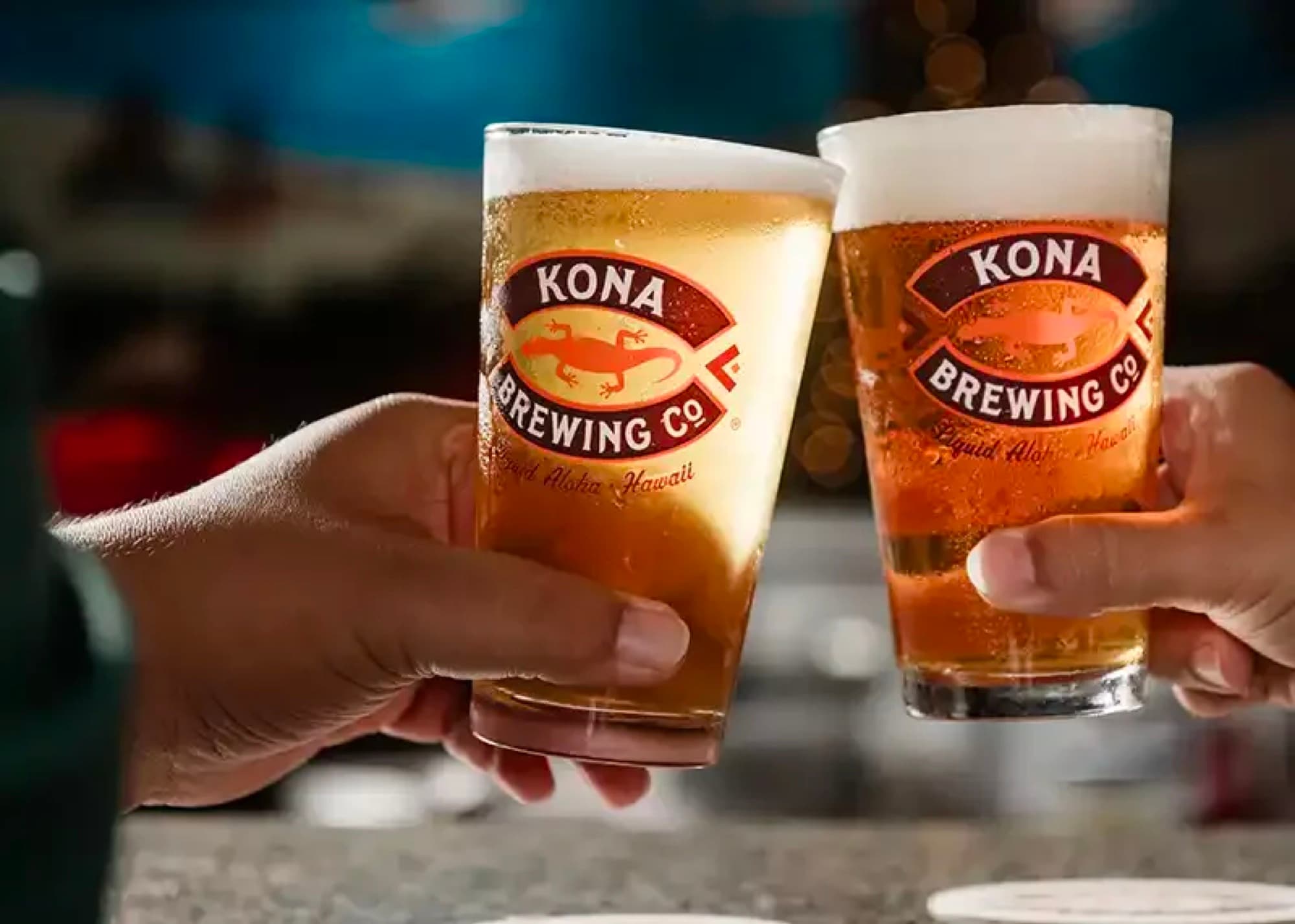 Kona Brewery — pint glasses cheers toast