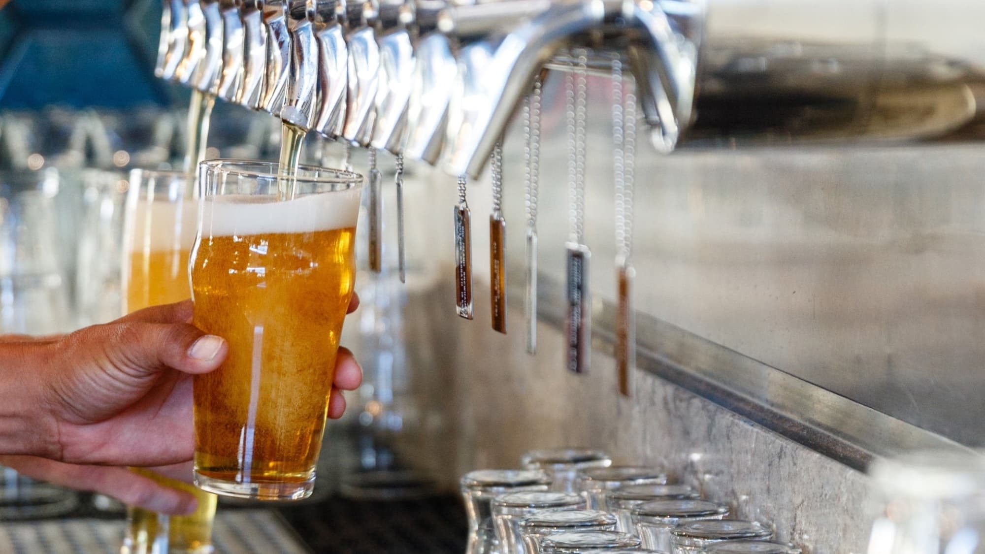 LBC Wailea Craft Kitchen — golden pint pour taps