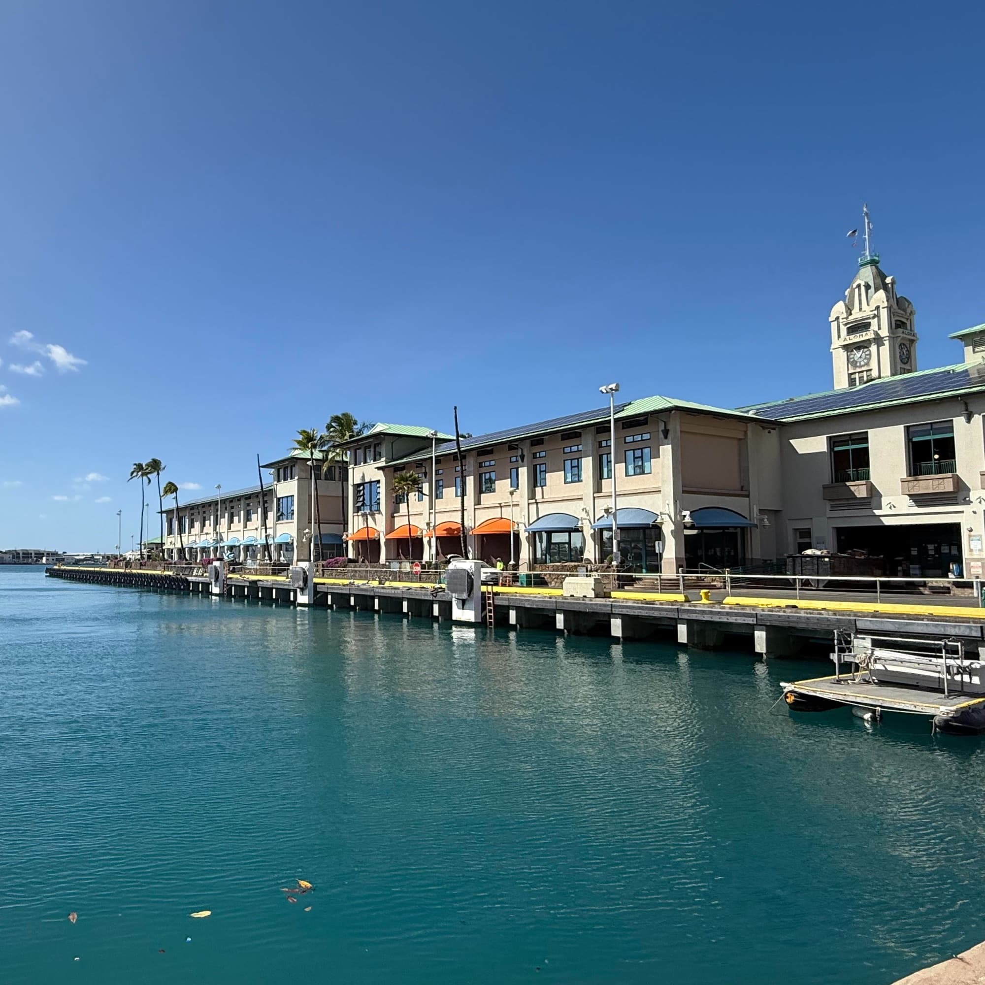 Lē'ahi Brewing Company — waterfront harbor building clocktower