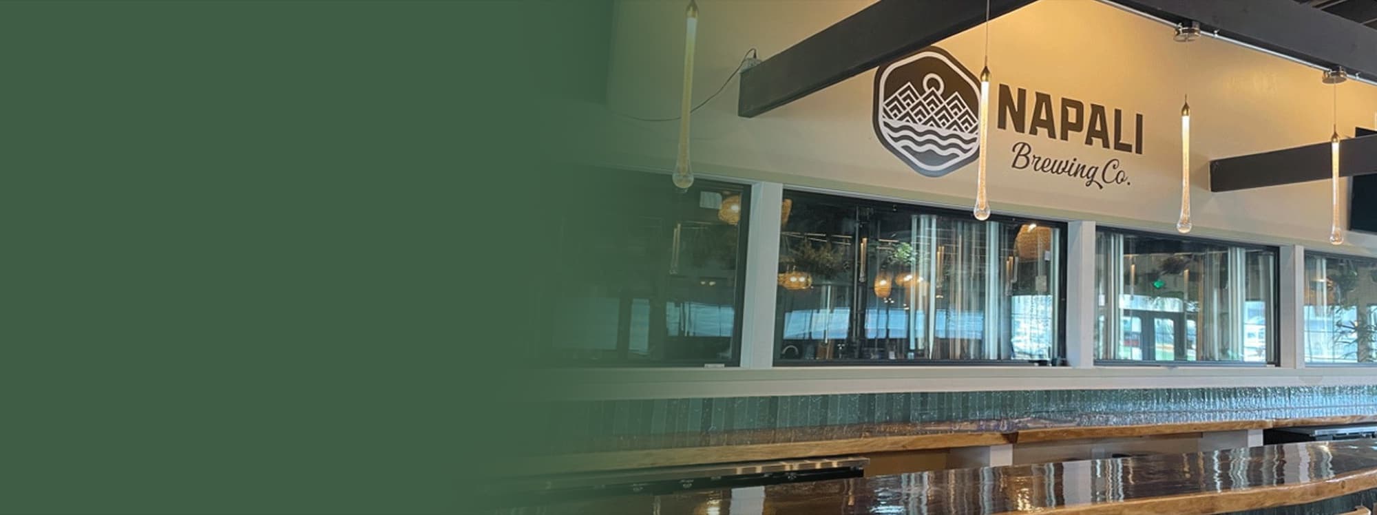 Napali Brewing Co. — bar counter logo signage