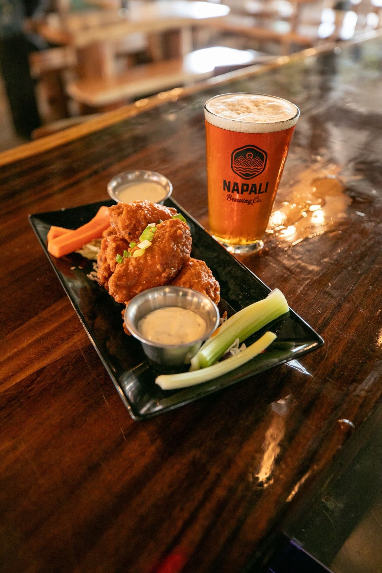 Napali Brewing Co. — buffalo wings plate pint glass